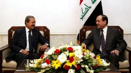 A handout picture dated November 4, 2010 shows Iraqi Prime Minister Nuri al-Maliki (R) meeting with Syria's ambassador to Iraq, Nawaf Fares, in Baghdad. 