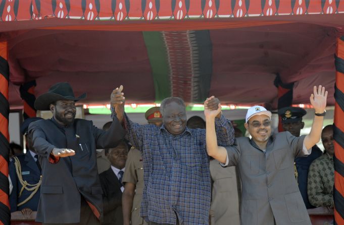 Left to right: President Salva Kiir of South Sudan, President Mwai Kibaki of Kenya and Meles Zenawi, Prime Minister of Ethiopia, raise their joined hands on March 2, 2012 following the ground breaking ceremony of LAPSSET.
