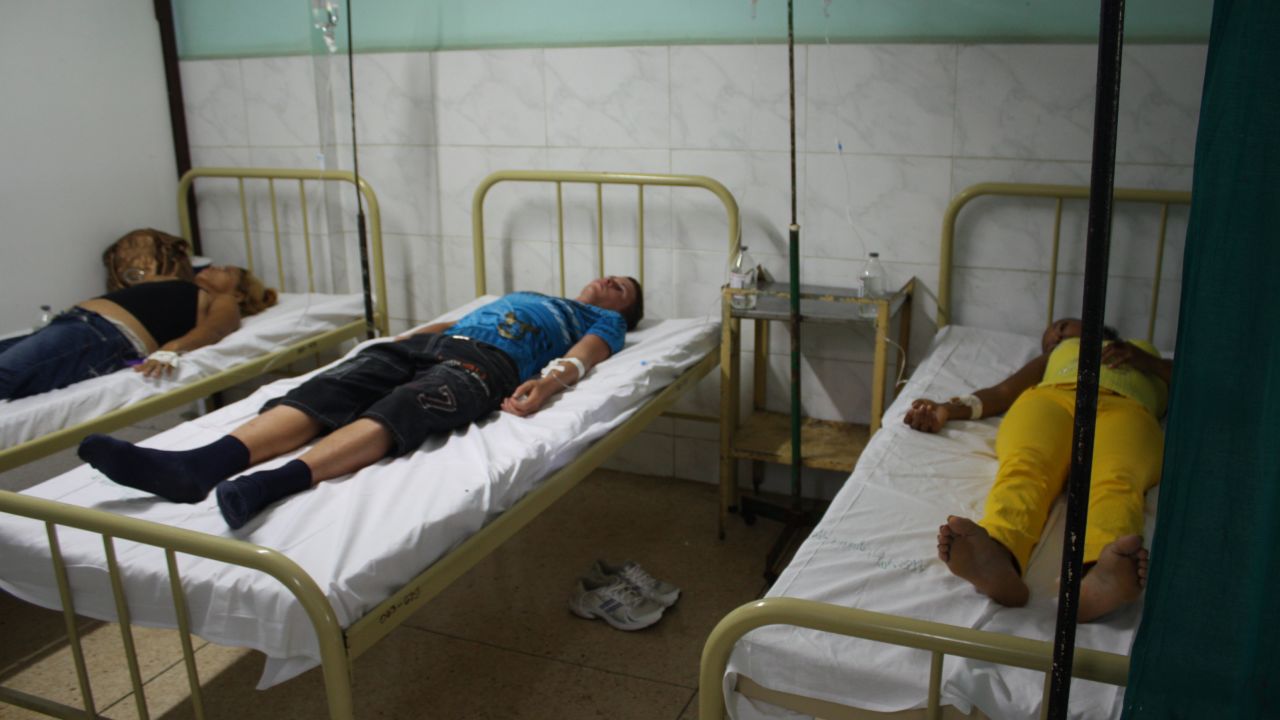 Patients are treated Wednesday at a hospital in Manzanillo, Cuba, where doctors are battling a cholera outbreak.