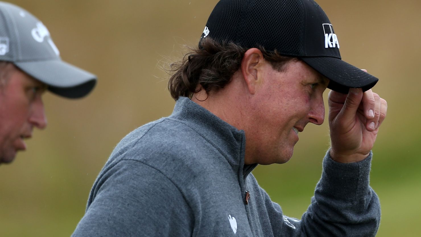 Phil Mickelson walks off the 18th green after his superb third round 65 at the Scottish Open. 