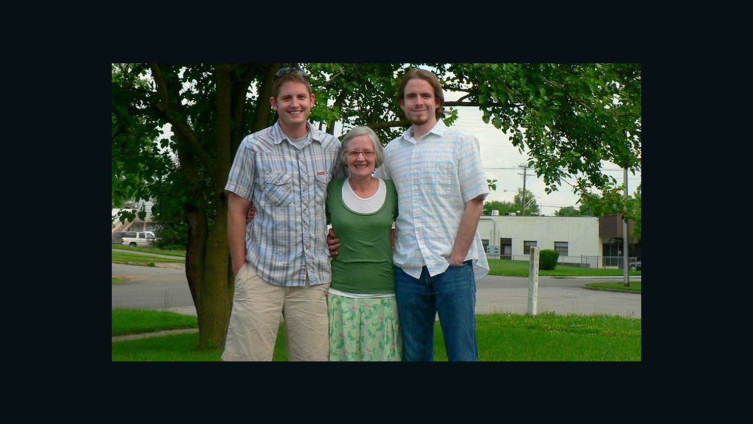 Aaron Collins, left, with his mother, Tina, and brother, Seth, in this undated family photo. 