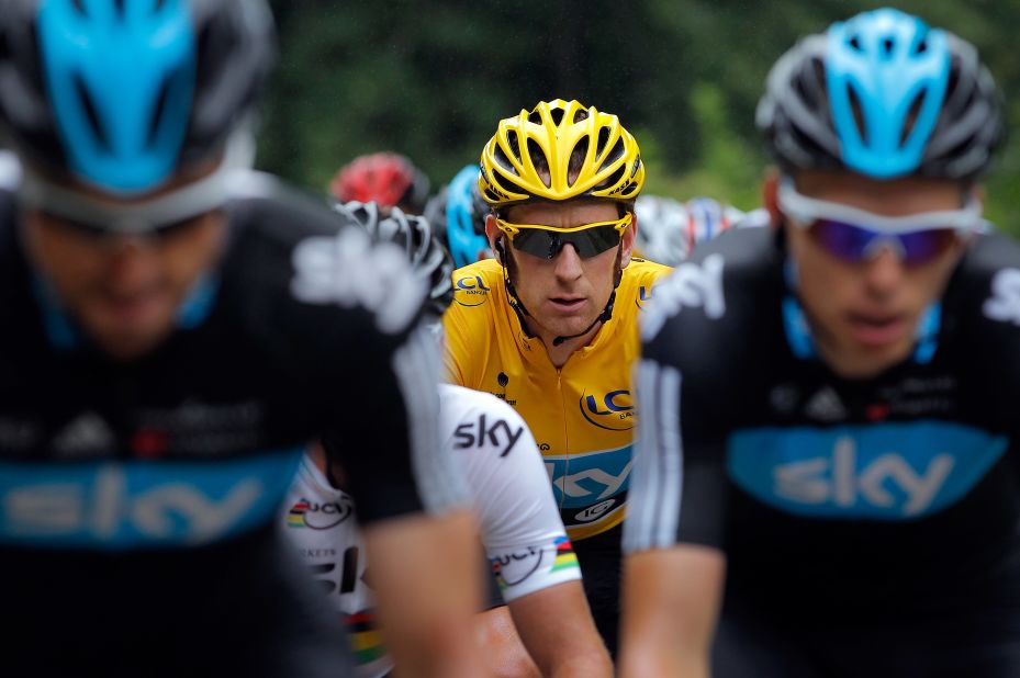 Bradley Wiggins of Great Britain, wearing the yellow jersey, maintains his position as the overall race leader, 2 minutes 5 seconds ahead of Team Sky teammate Christopher Froome, on Sunday.