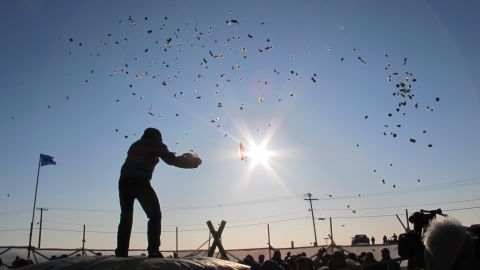 Barrow, Alaska, residents enjoy a traditional blanket toss. The community is wrestling with the idea of proposed off-shore oil rigs. 