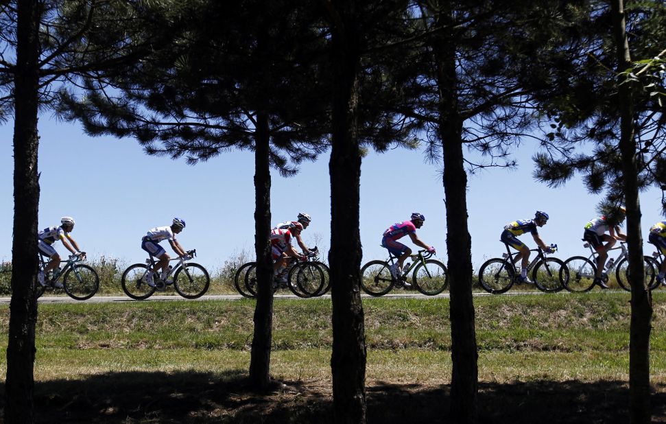 The main pack of riders pass through the French countryside during Monday's course.