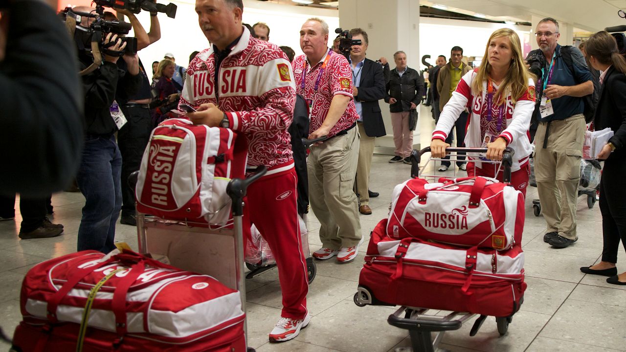 Members of Russia's Olympic sailing team arrive at Heathrow airport in west London on July 16, 2012.