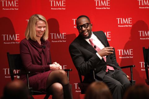 Mayer and musician and activist Wyclef Jean attend TIME's 2010 Person of the Year Panel in November 2010.