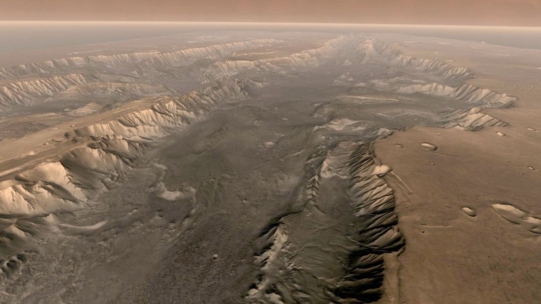The Valles Marineris rift system on Mars is 10 times longer, five times deeper and 20 times wider than the Grand Canyon. This composite image was made from NASA's Mars Odyssey spacecraft, which launched in 2001.