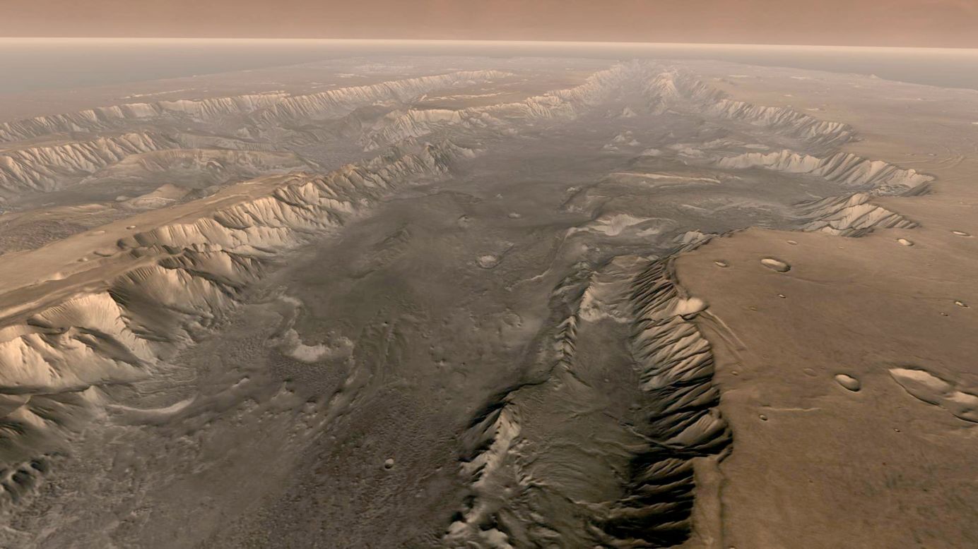 La grieta del sistema Valles Marineris en Marte es 10 veces mas larga, 5 veces mas profunda y 20 veces mas ancha que la del Gran Cañon. Esta imagen compuesta fue hecha a bordo de la nave especial Odyssey, lanzada en el 2001.