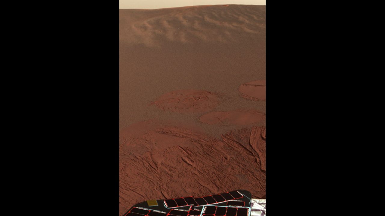 Pictured is the Martian landscape at Meridiani Planum, where the Mars Exploration Rover Opportunity successfully landed in 2004. This is one of the first images beamed back to Earth from the rover shortly after it touched down.