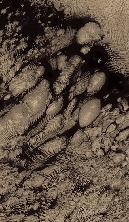 Una imagen de la Mars Global Surveyor en 2000 muestra potencial evidencia de enormes depósitos sedimentarios en el oeste del cráter de impacto Arabia Terra sobre la superficie de Marte.