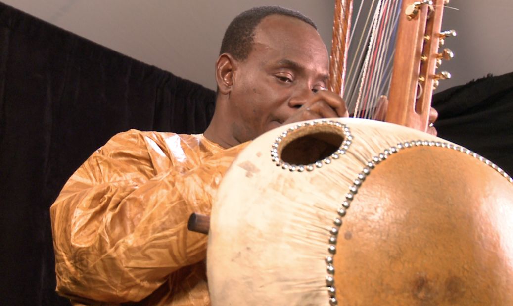 Diabate was born in Bamako, the capital of Mali, in 1965. He plays the kora, a 21-string harp-like instrument from West Africa.