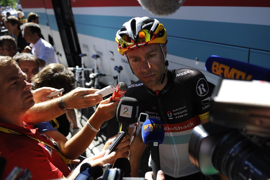 Germany's Jens Voigt of team Radioshack-Nissan answers journalists' questions Wednesday after teammate Frank Schleck tested positive for a banned substance overnight and withdrew from the race.