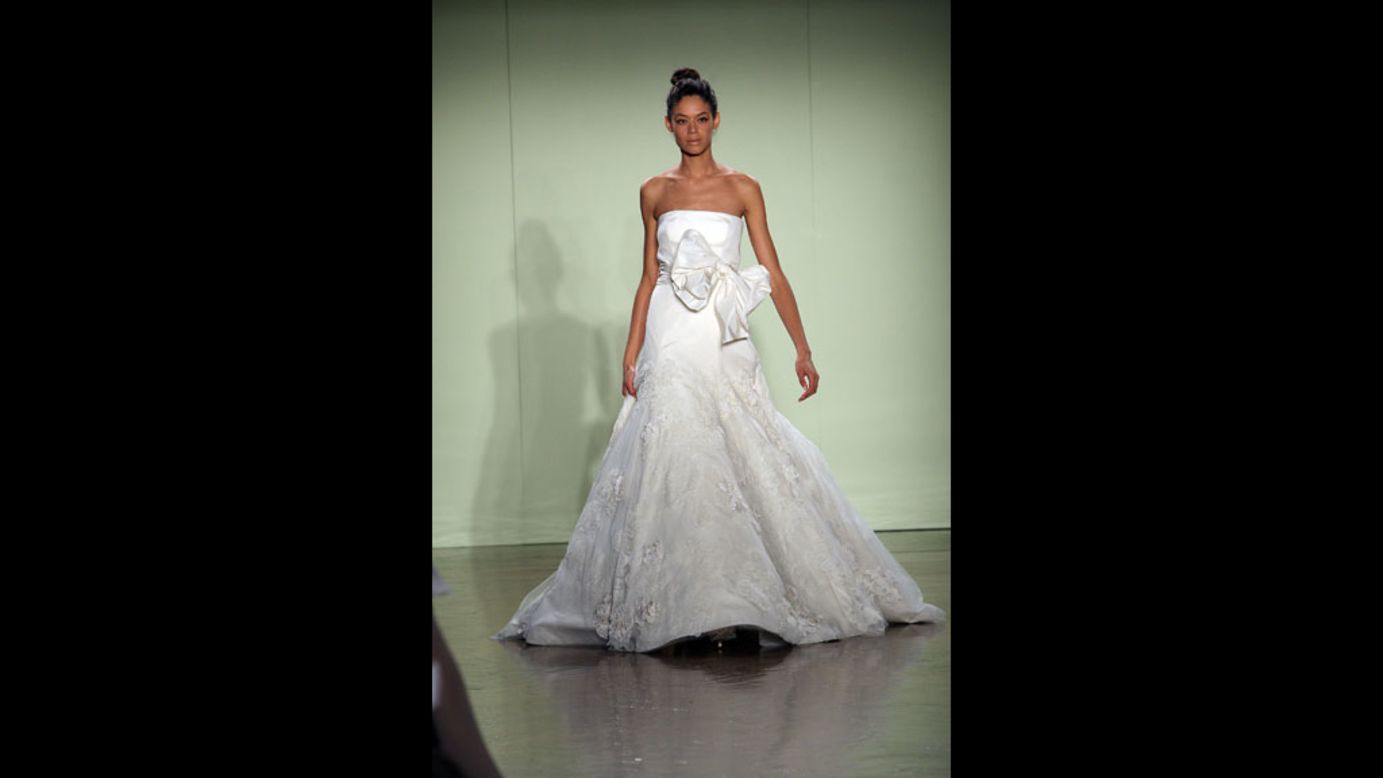 A model walks the runway wearing a strapless gown with large bow detail during the 2007 Vera Wang bridal collection show in New York City.