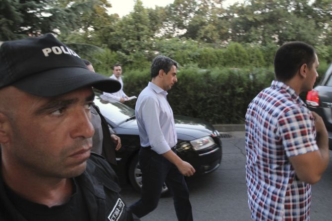 President Rosen Plevneliev, center, walks near the site of the explosion. Bulgaria will ask the U.N. Security Council to condemn the attack.