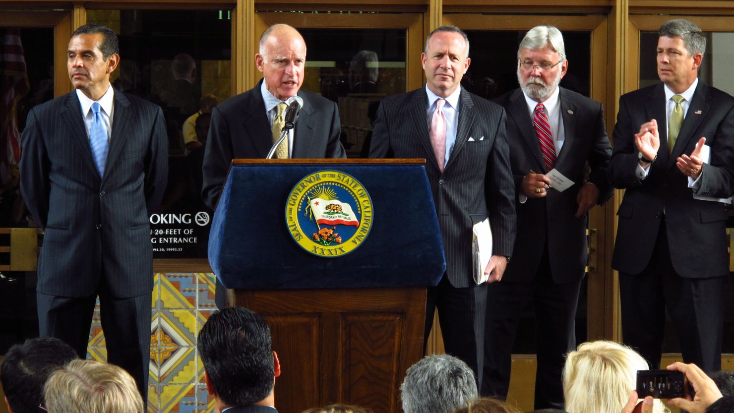 California Gov. Jerry Brown speaks Wednesday in Los Angeles before signing a bill to create a high-speed rail project.