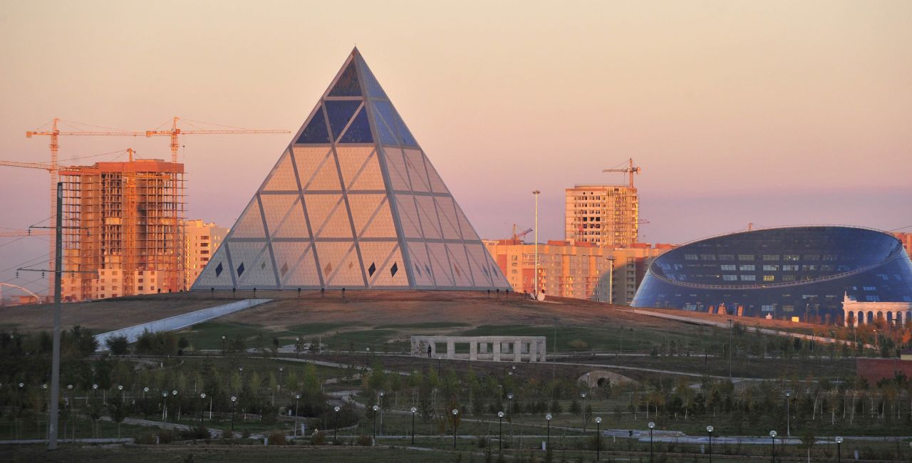 As well as its Tour de France-winning team, the Kazakhstan capital's bulging, science fiction-like skyline has helped win the country international recognition. Pictured here is the Palace of Peace and Reconciliation (center) and the Shabyt Palace of Art (right).