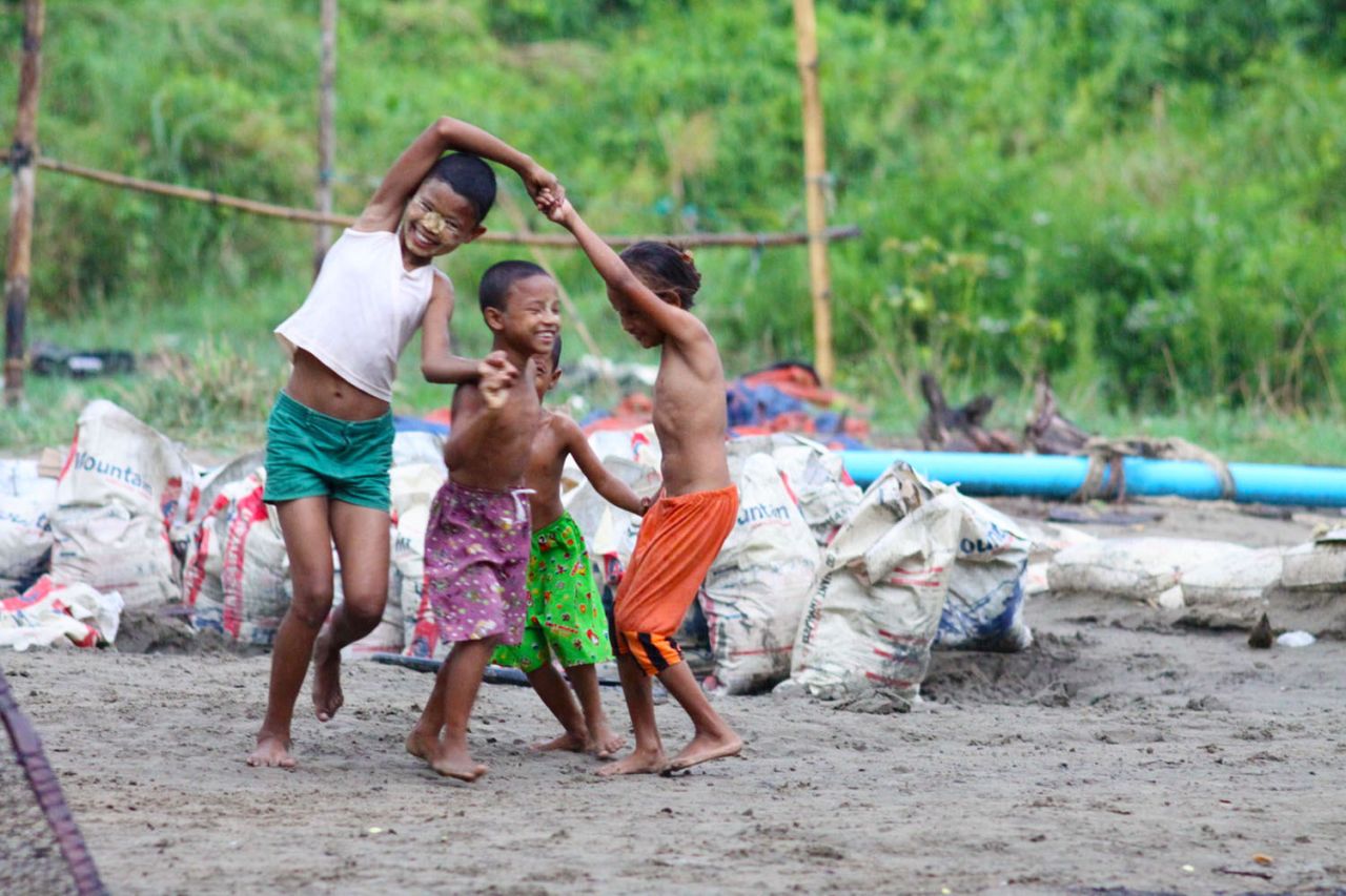 Regardless of the weather not cooperating, <a href="http://ireport.cnn.com/docs/DOC-814208">iReporter Jim Heston captured this beautiful photo</a> of children playing from his day trip to Dala in Myanmar. 