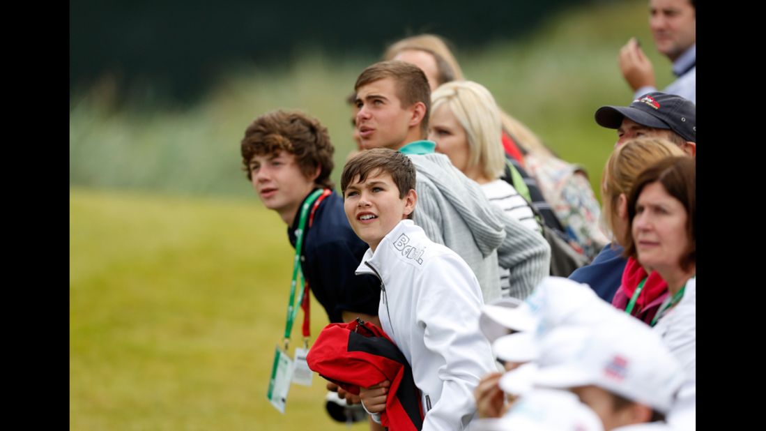 Junior spectators take in the action during the first round Thursday.