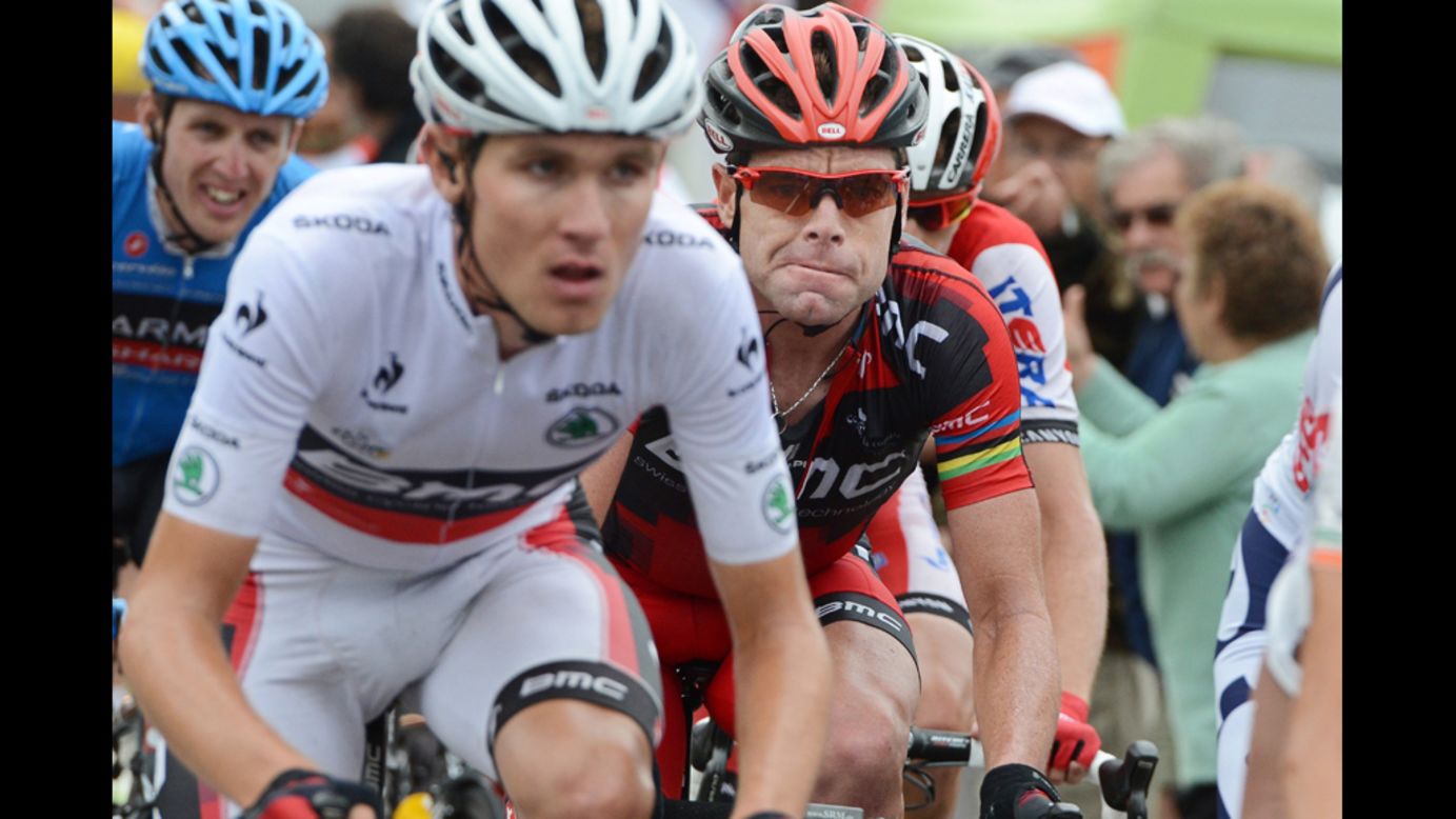 Australian rider Cadel Evans of Team BMC, right, follows closely behind teammate Tejay Van Garderen of the United States, left, who is currently wearing the race's "best young rider's" jersey.