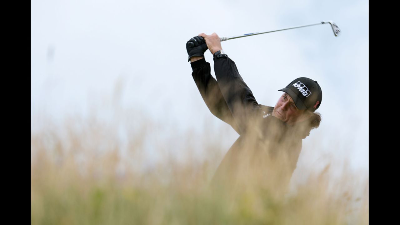 Phil Mickelson of the United States hits his tee shot on the 11th hole on Thursday.