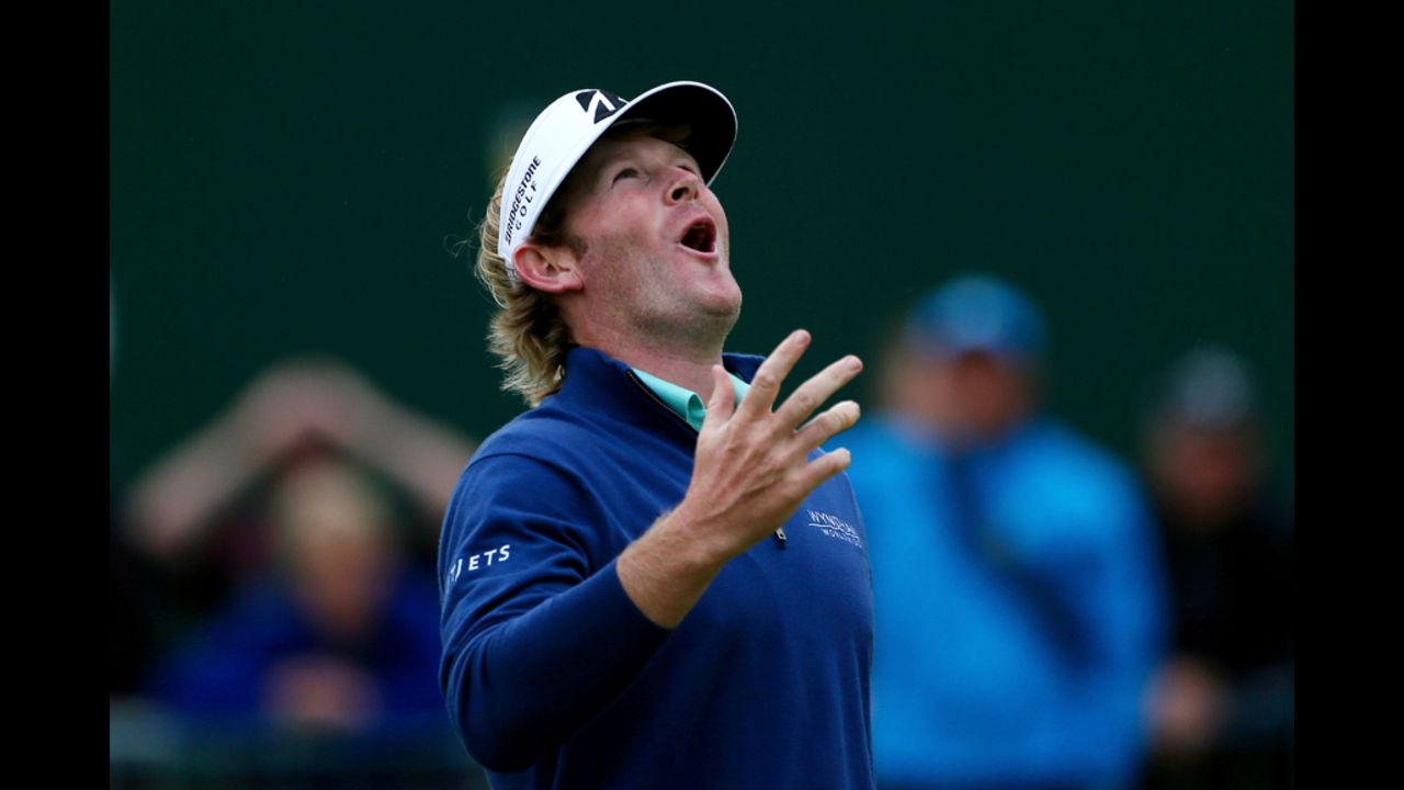 Brandt Snedeker of the United States reacts to his putt on the 18th hole during the first round on Thursday.