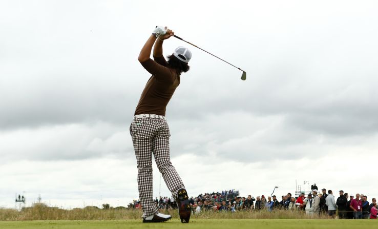 Ryo Ishikawa of Japan tees off on the fifth hole Thursday.