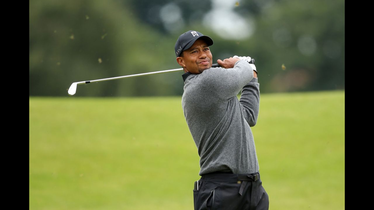 Tiger Woods of the United States hits his second shot on the second hole during the second round Friday.