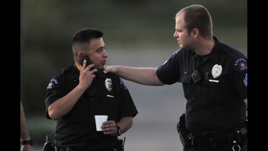 Officers gather at the theater July 20, 2012.