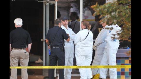 Investigators were a common sight at the theater on July 20, 2012.