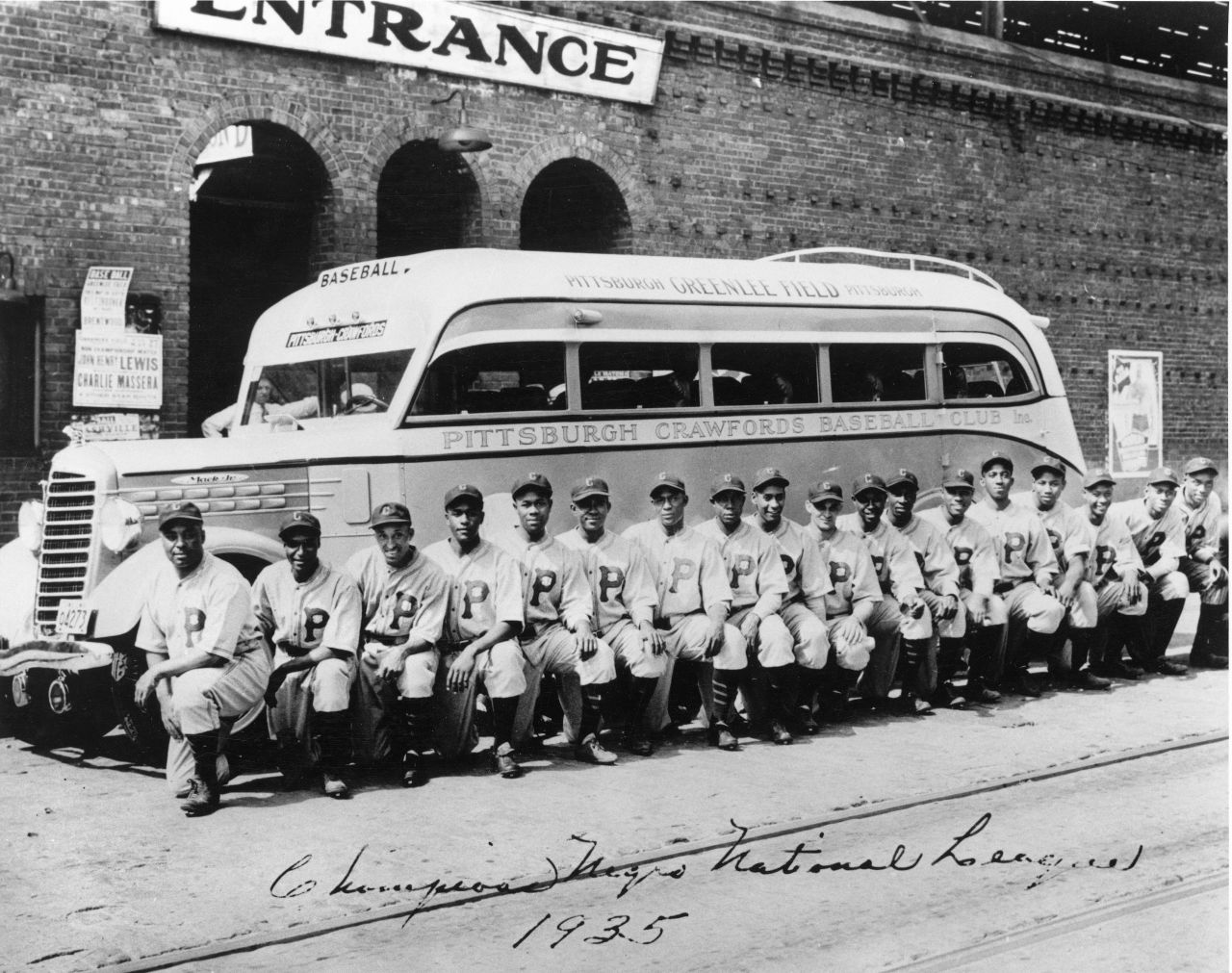 Here, the 1935 Negro Leagues Pittsburgh Crawfords pose in front of their team bus, similar to the bus the Anderson Monarchs are traveling in across the United States. 