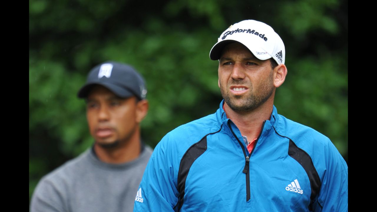 Sergio Garcia of Spain and Tiger Woods of the United States look on at the first tee during the second round Friday. 