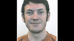 The shooter was identified by two federal law enforcement officers as James Holmes, 24, of Aurora