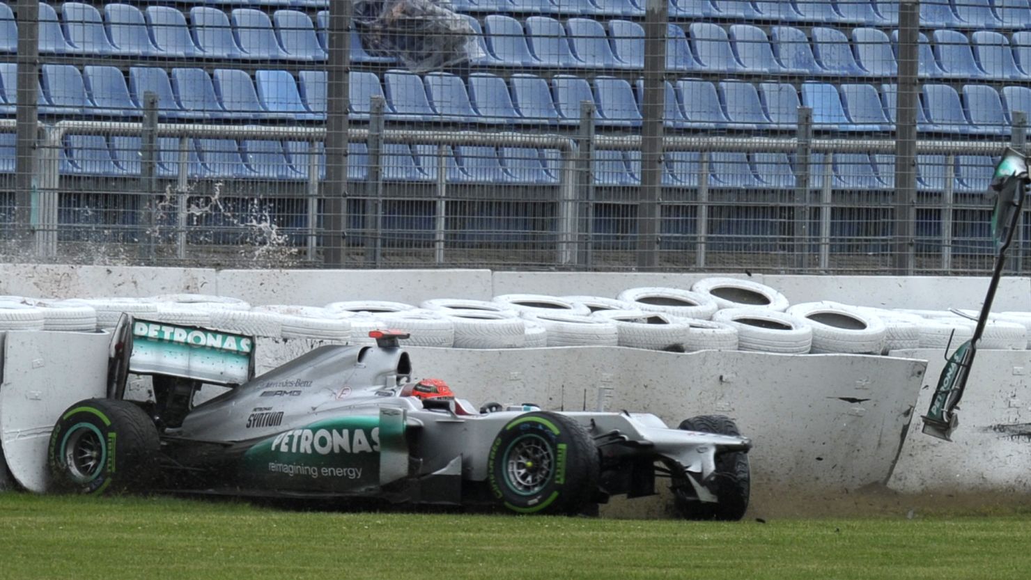 Michael Schumacher crashes in the final minutes of Friday's second practice session at the German grand prix
