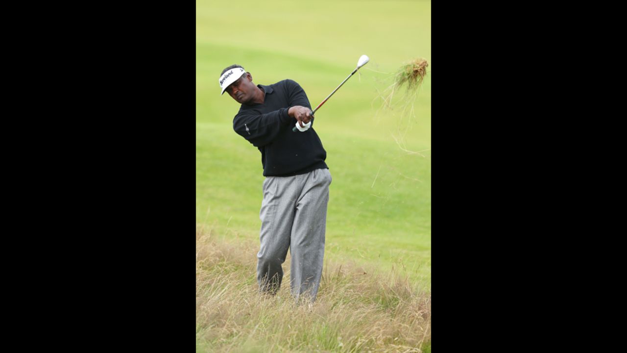 Vijay Singh of Fiji plays out of the rough on the 13th hole on Friday.