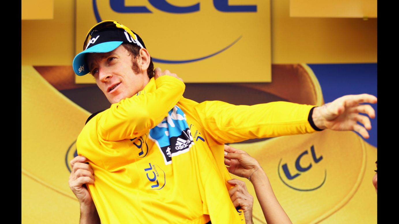 Bradley Wiggins of Great Britain and SKY Procycling retained his race leader's yellow jersey after Stage 18 on Friday.