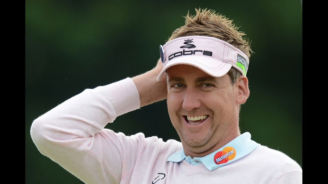 England's Ian Poulter walks off the 18th green during the second round on Friday.