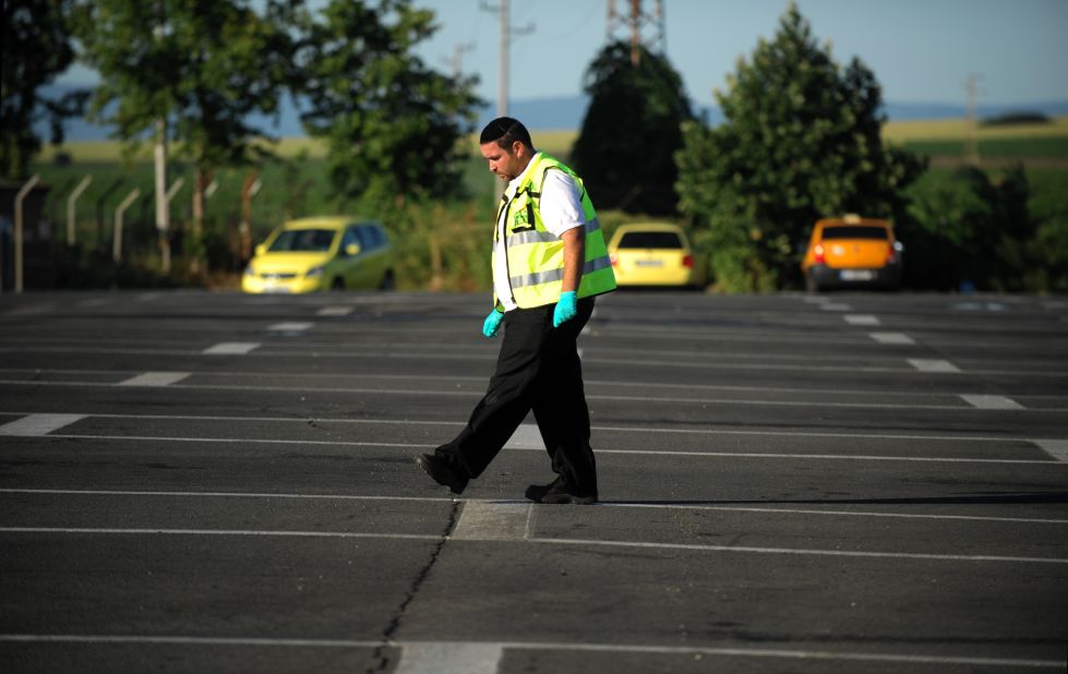 A member of the Israeli rescue and recovery squad searches for evidence at the airport in Burgas, the site of a suicide blast targeting Israelis on July 19.