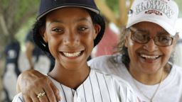Along their cross-country journey, Philadelphia's Anderson Monarchs played games against local youth teams, visited historic sites and met surviving Negro League players. Here, Mamie "Peanut" Johnson, right, the only female pitcher in the Negro Leagues, meets her 21st century counterpart, Mo'ne Davis, 11.