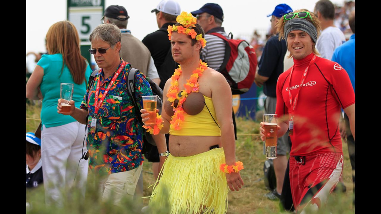 Golfers must dress appropriately to play in the Open. Rules for fans are more relaxed.
