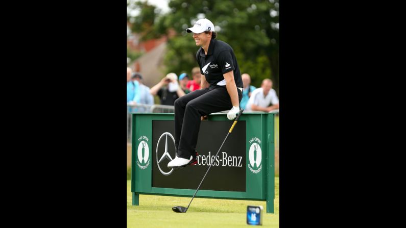 Rory McIlroy sits as he waits to tee off on the 16th hole.