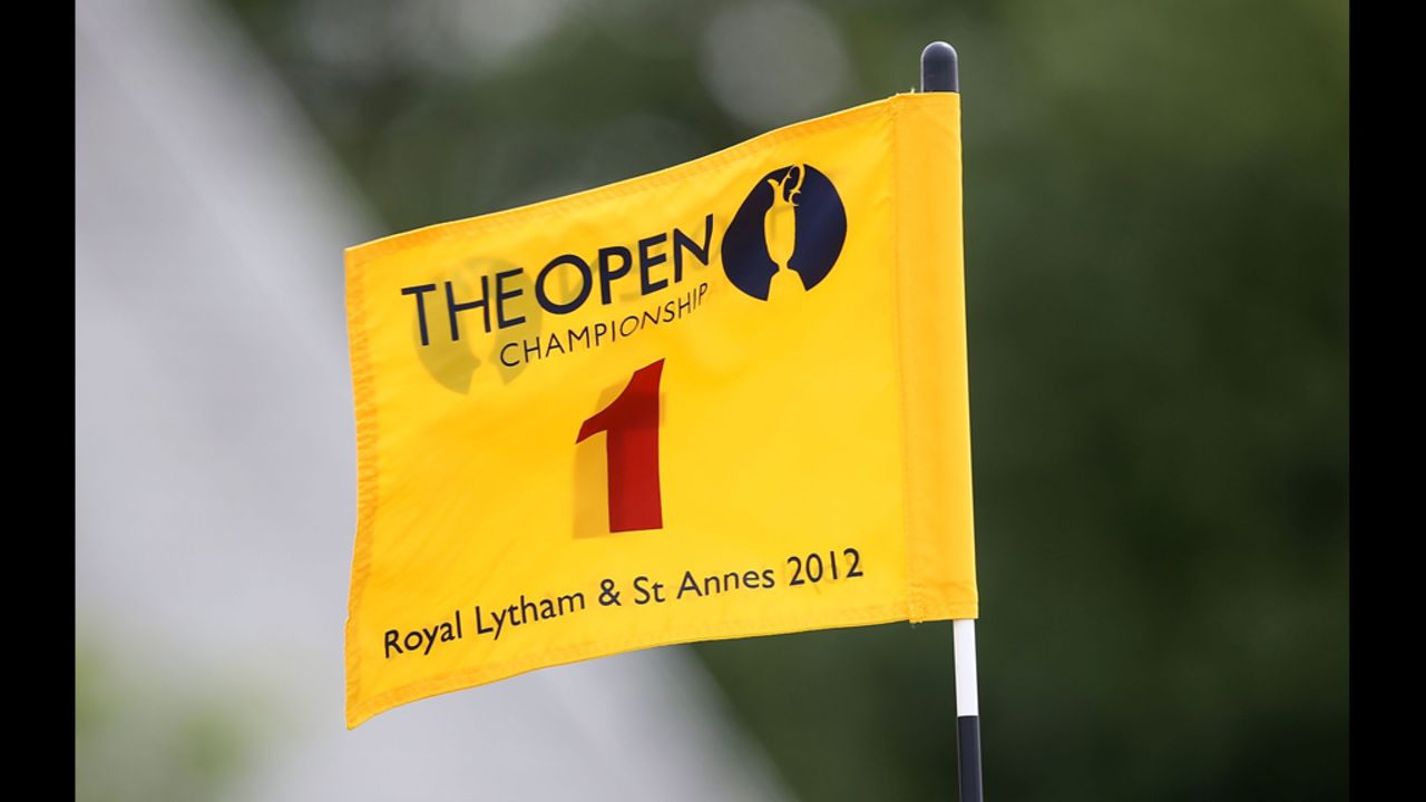 Wind whips the flag on the first green at Royal Lytham and St. Annes.