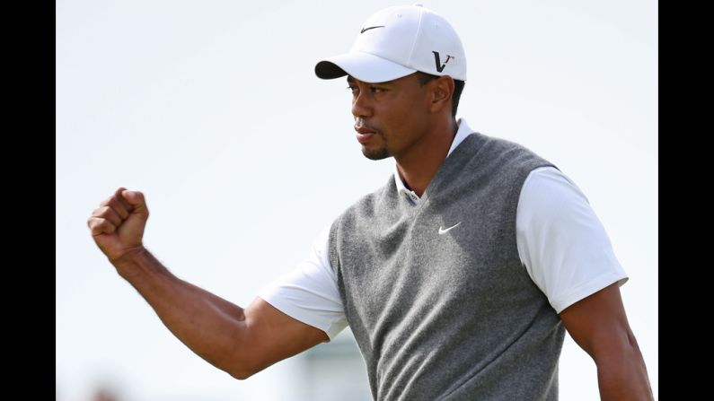 Woods celebrates a birdie at No. 6.