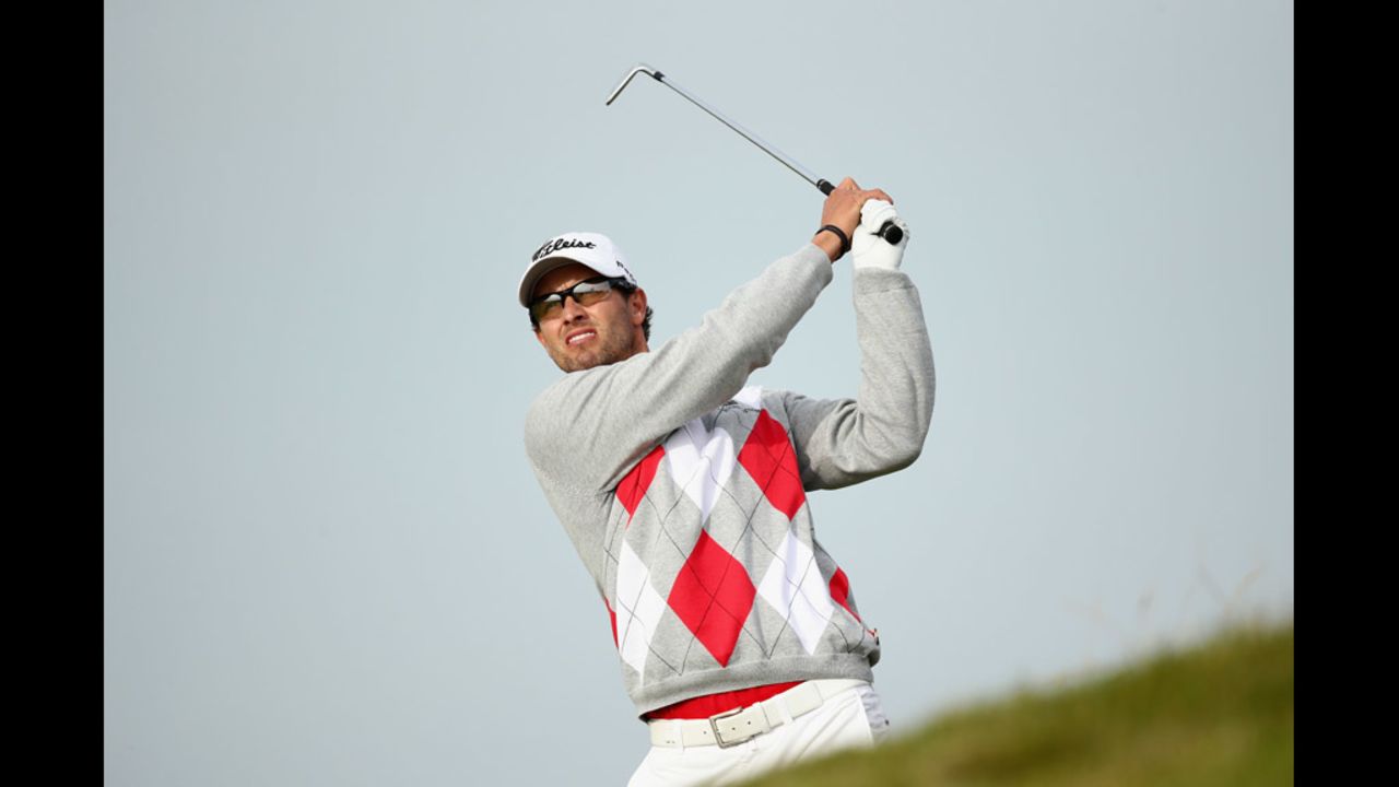 Adam Scott of Australia hits an approach shot on Saturday, July 21, at Royal Lytham & St. Annes Golf Club in England during the third round of the British Open on Saturday. Scott finished with a four-shot lead going into the final round of golf's oldest major championship 