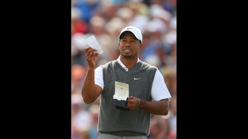 Tiger Woods makes some calculations before teeing off at No. 5.