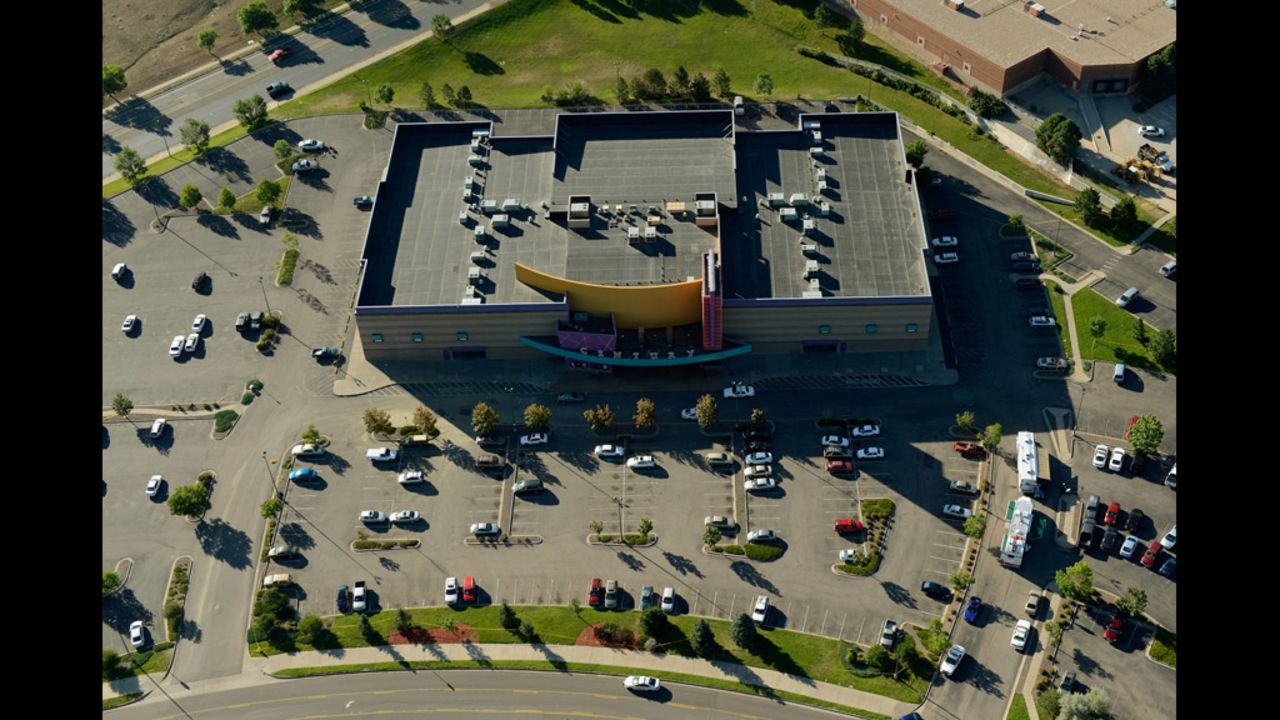 Police investigate outside the Century 16 multiplex July 21, 2012, a day after the mass shooting. 