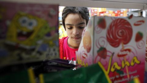 Moheeb works at a supermarket in Amman, Jordan. He was wounded before his family fled Syria in March.