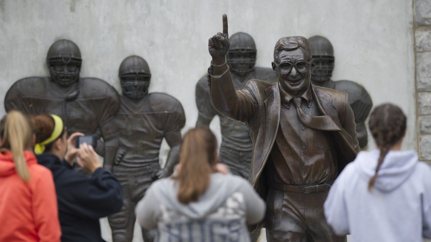 A  Joe Paterno statue has been removed. A lawsuit by the school's insurer is the latest fallout from the Sandusky case.