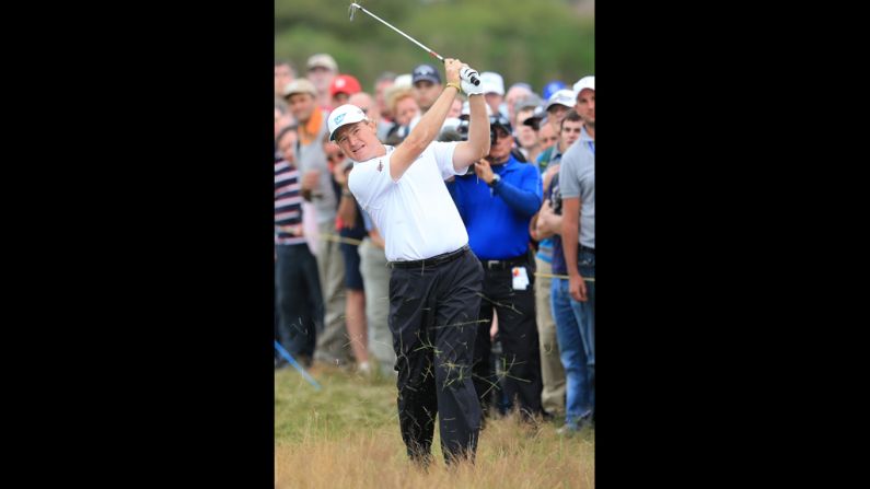 Ernie Els hits his second shot on the 15th hole Sunday.