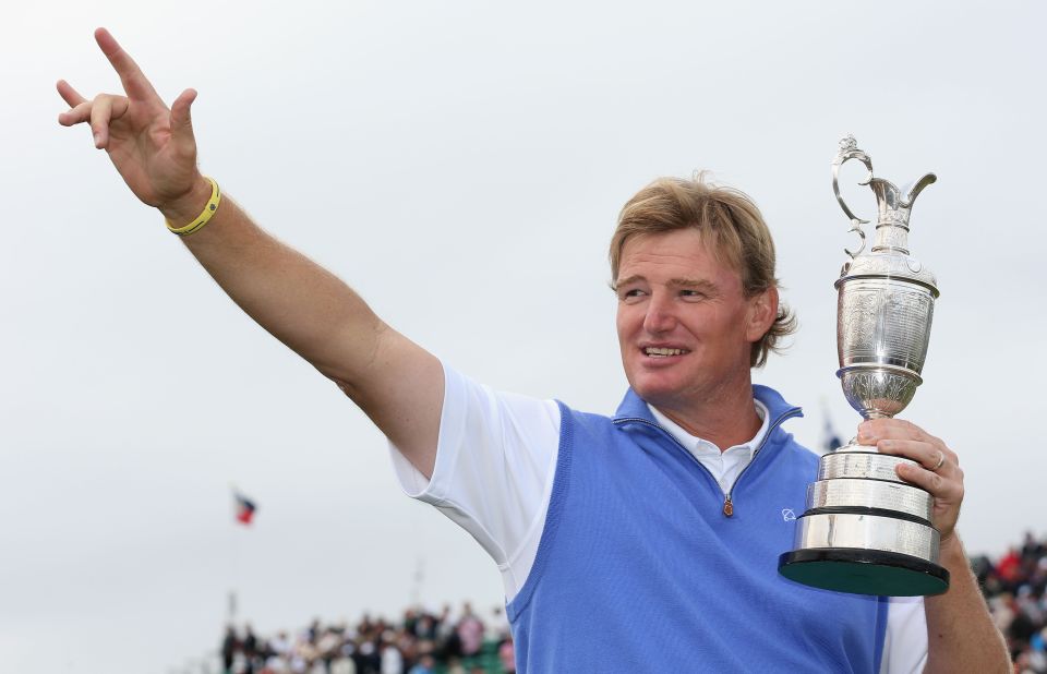 Ernie Els of South Africa celebrates with the Claret Jug after his victory during the final round of play at the British Open at the Royal Lytham & St. Annes Golf Club in England on Sunday, July 22. See all the action as it unfolds here.