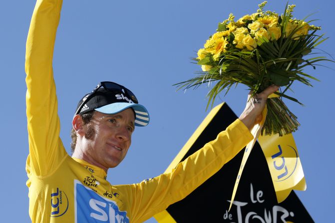 Wiggins stands on the podium after winning the Tour de France in a historic first for a British rider -- he would be followed by former teammate Chris Froome, the victor in 2013, 2015 and 2016.